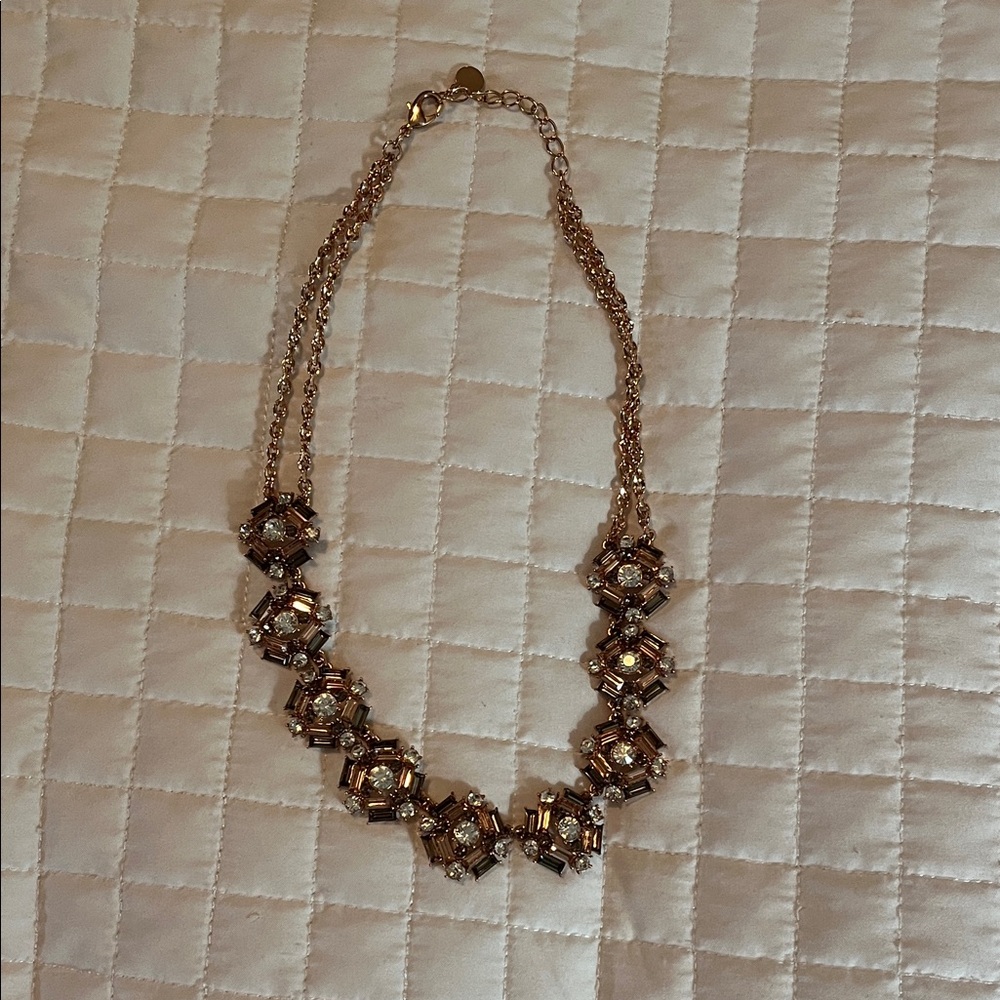 Elegant Gold color Necklace with glass stones.